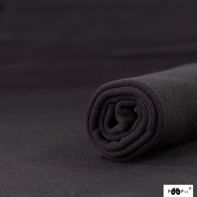 Ribbing in solid black organic cotton fabric