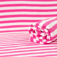 Ribbing in hot pink and white stripes organic cotton knit fabric