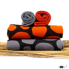 Stones in rust organic cotton jersey knit fabric