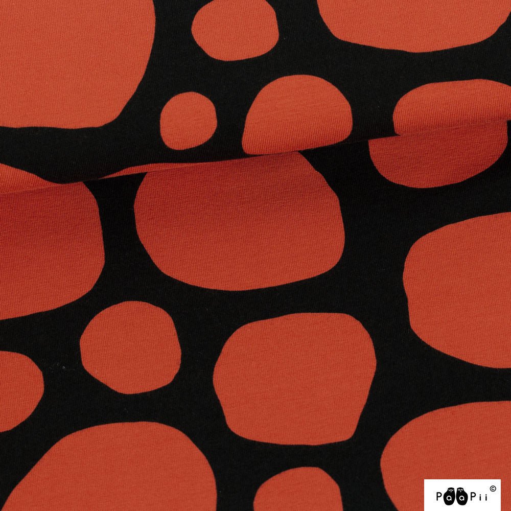 Stones in rust organic cotton jersey knit fabric